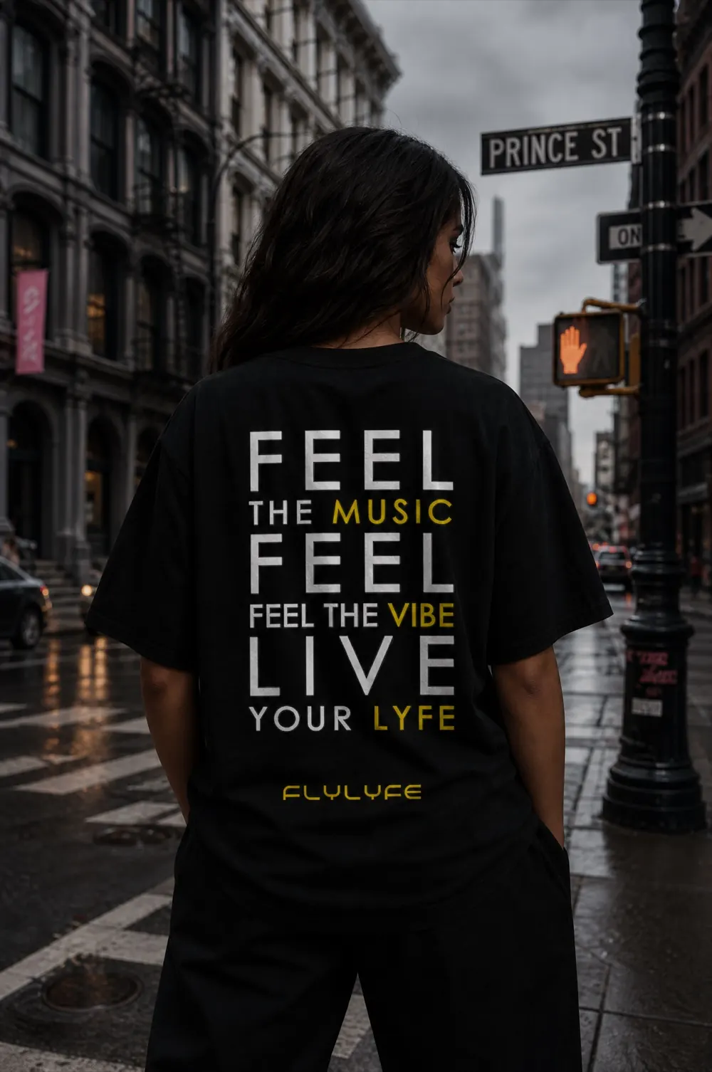 FLYLYFE women's Feel the Music tee, back design, worn by model Wren on Prince St NYC
