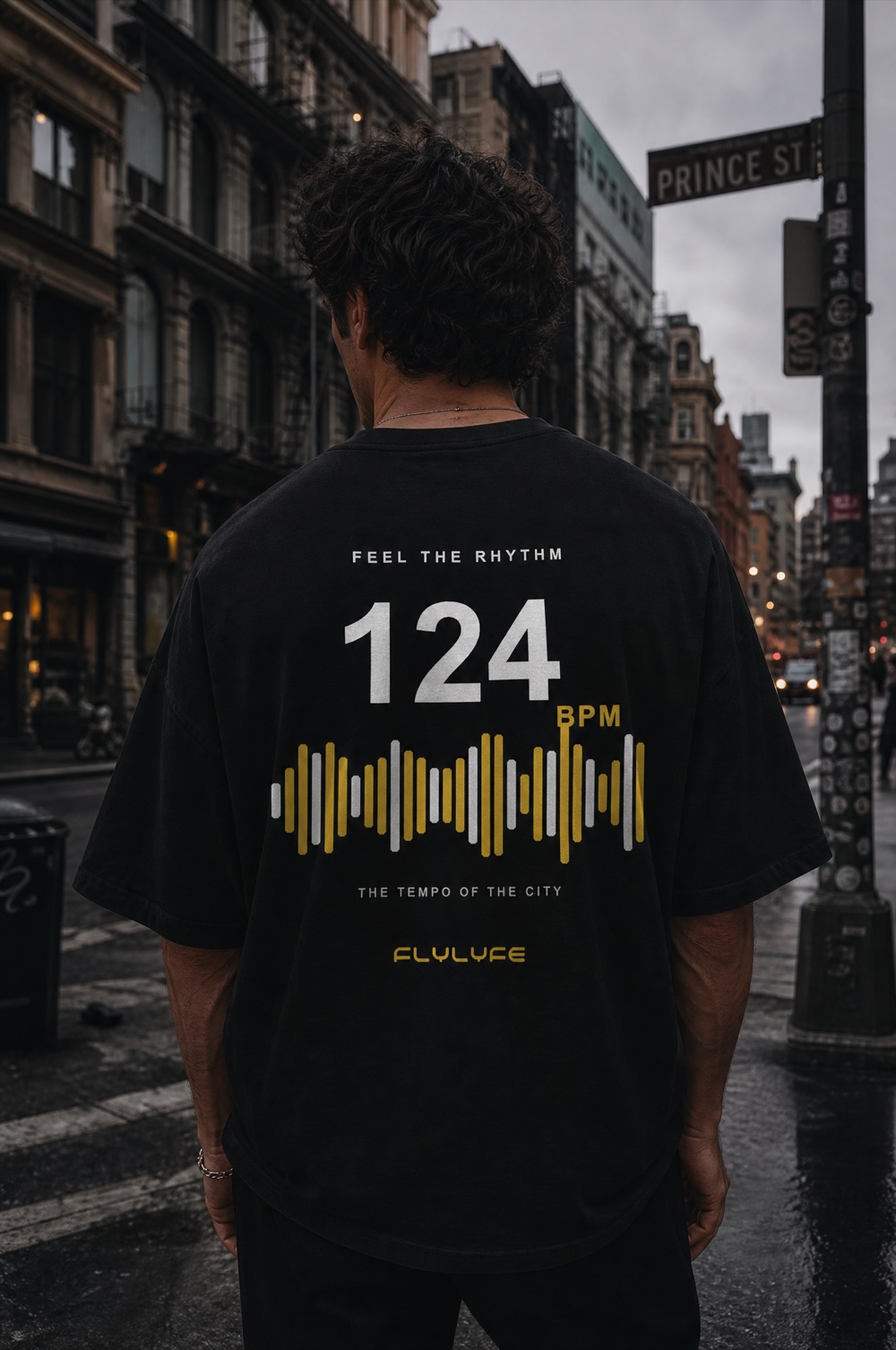 FLYLYFE Tempo tee — 124 BPM waveform back print, worn on a model in NYC
